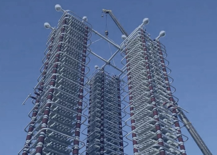 corona ring for high voltage capacitor